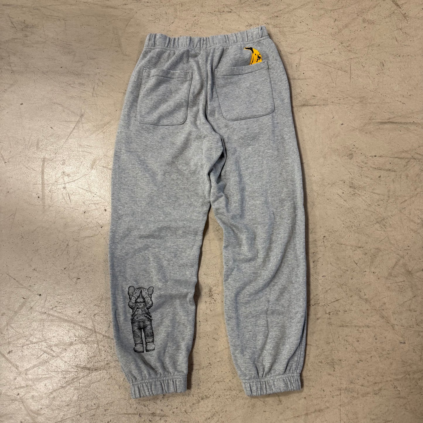 Jogging Kaws Uniqlo Grise Occasion